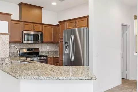Kitchen - 5084 Tranquil Way #101, Oceanside, CA 92057 photo 4 of 8