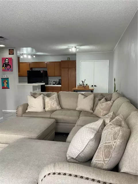 Living - 12620 Briarglen Loop UNIT I, Stanton, CA 90680 photo 7 of 9