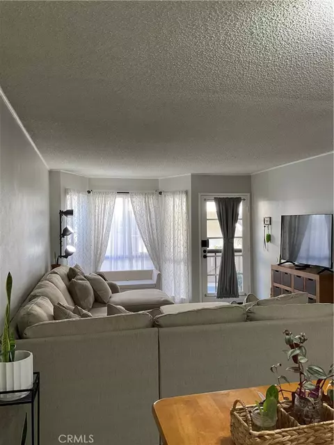 Living - 12620 Briarglen Loop UNIT I, Stanton, CA 90680 photo 2 of 9