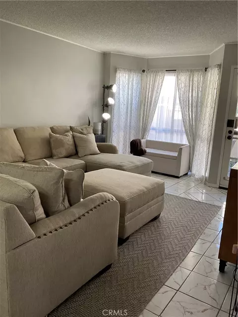 Living - 12620 Briarglen Loop UNIT I, Stanton, CA 90680 photo 4 of 9