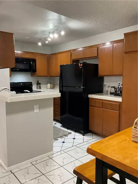 Kitchen - 12620 Briarglen Loop UNIT I, Stanton, CA 90680 photo 3 of 3