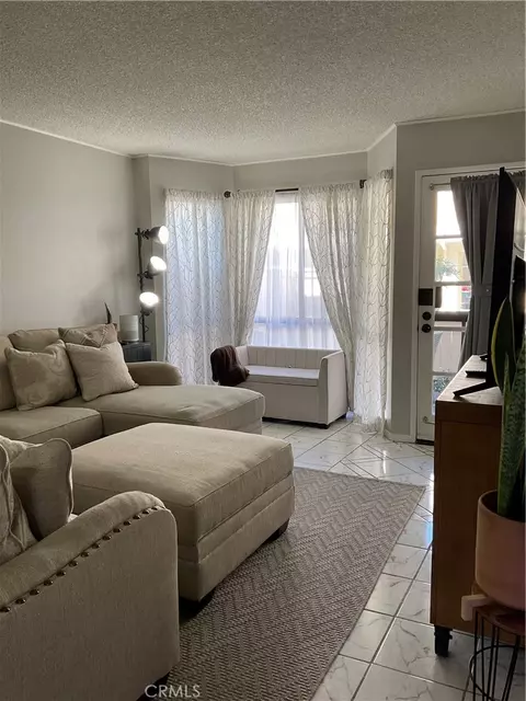 Living - 12620 Briarglen Loop UNIT I, Stanton, CA 90680 photo 5 of 9