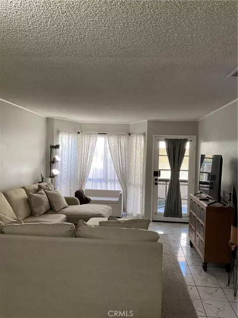 Living - 12620 Briarglen Loop UNIT I, Stanton, CA 90680 photo 1 of 9