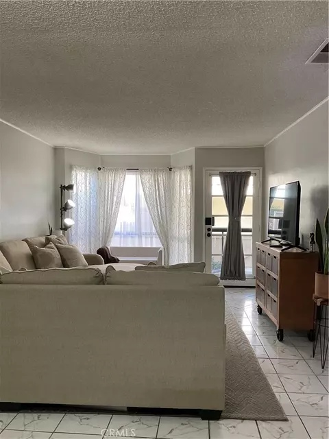 Living - 12620 Briarglen Loop UNIT I, Stanton, CA 90680 photo 3 of 9