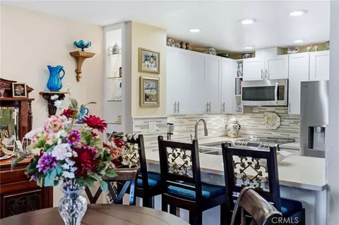 Kitchen - 7890 E Spring St #2L, Long Beach, CA 90815 photo 1 of 3