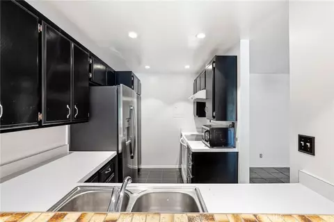 Kitchen - 7890 E Spring St #11E, Long Beach, CA 90815 photo 1 of 3