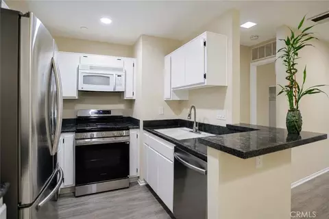 Kitchen - 12635 Briarglen Loop #K, Stanton, CA 90680 photo 3 of 4