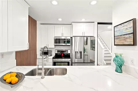 Kitchen - 7890 E Spring St #5L, Long Beach, CA 90815 photo 2 of 3