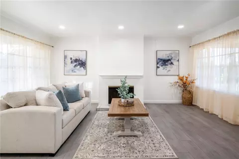 Living - 7441 Irwingrove Dr, Downey, CA 90241 photo 2 of 3
