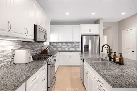 Kitchen - 3363 E Pine Rdg, Ontario, CA 91761 photo 2 of 3