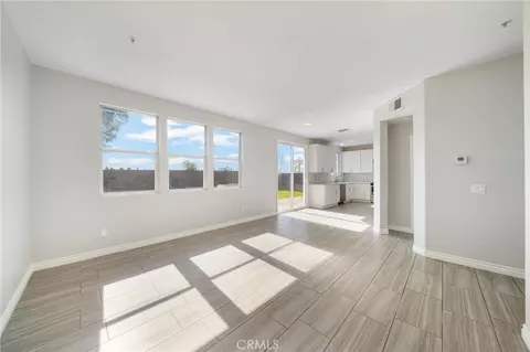 Living - 7375 Mcclellan Ct, Fontana, CA 92336 photo 5 of 9