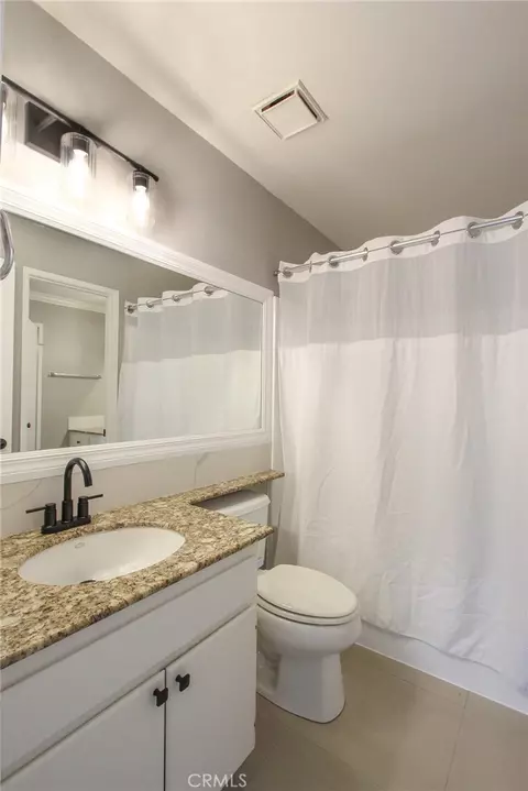Bath - 12640 Briarglen Loop #F, Stanton, CA 90680 photo 2 of 5
