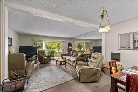 Living - 7890 E Spring St #16E, Long Beach, CA 90815 photo 1 of 2