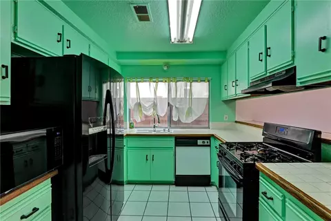 Kitchen - 623 W Indigo St, Compton, CA 90220 photo 1 of 2