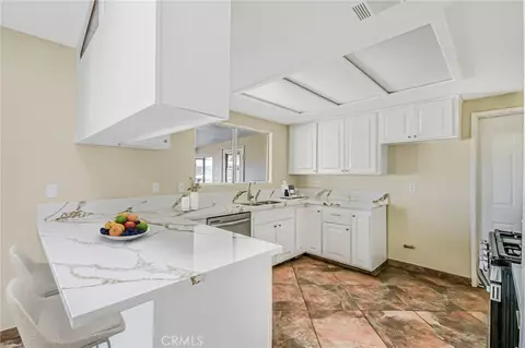Kitchen - 11694 Pepper St, Hesperia, CA 92345 photo 3 of 4