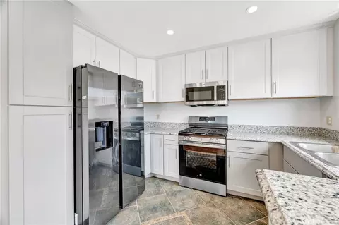 Kitchen - 7420 Corbin Ave #8, Reseda, CA 91335 photo 2 of 3