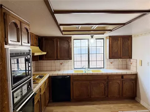 Kitchen - 42802 Sachs Dr, Lancaster, CA 93536 photo 2 of 2