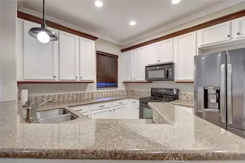 Kitchen - 8692 9th St E #29, Rancho Cucamonga, CA 91730 photo 2 of 3