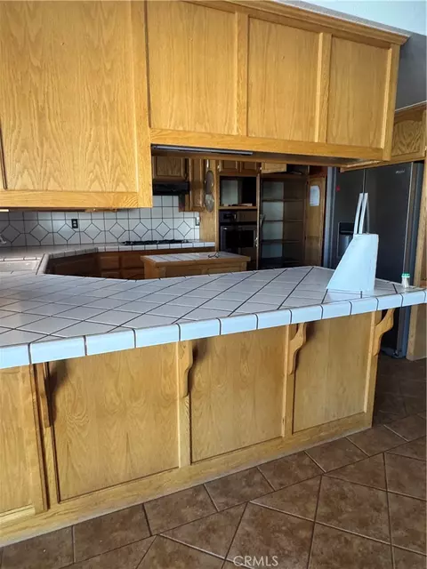 Kitchen - 18965 Siskiyou Rd, Apple Valley, CA 92307 photo 1 of 4