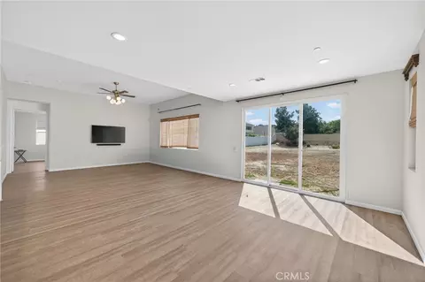 Living - 1562 Mckimball Rd, Perris, CA 92570 photo 2 of 6