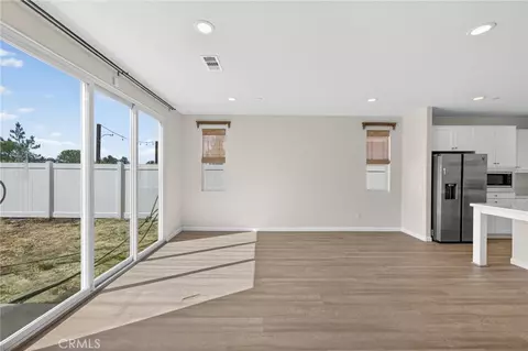 Living - 1562 Mckimball Rd, Perris, CA 92570 photo 4 of 6
