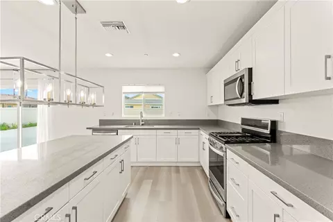 Kitchen - 26575 Stix Dr, Menifee, CA 92585 photo 2 of 2