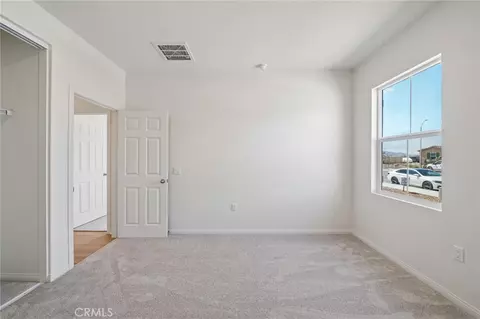 Bedroom - 27341 Dunite Dr, Perris, CA 92571 photo 4 of 13