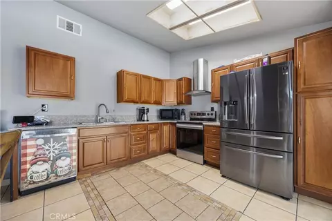 Kitchen - 10716 Wakefield St E, Adelanto, CA 92301 photo 2 of 2