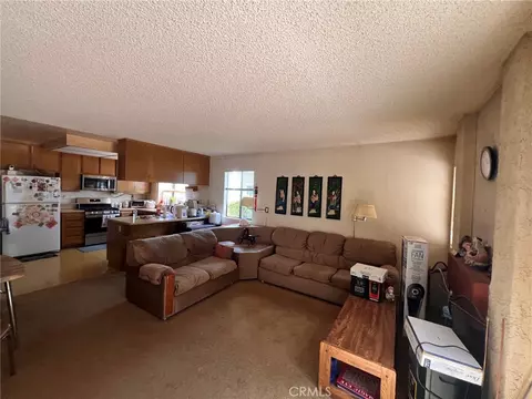 Living - 63 Rainbow Rdg, Phillips Ranch, CA 91766 photo 2 of 2