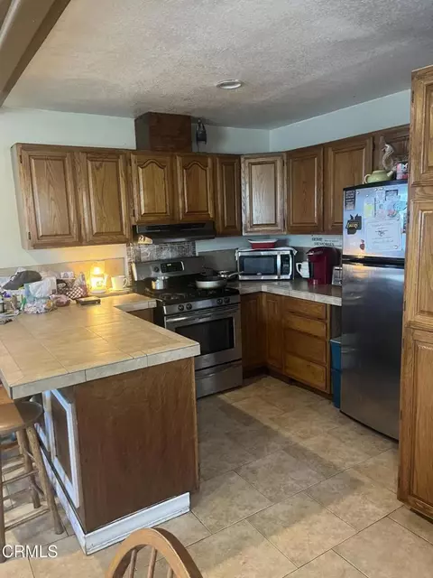 Kitchen - 211 Featherstone St, Oxnard, CA 93030 photo 2 of 2