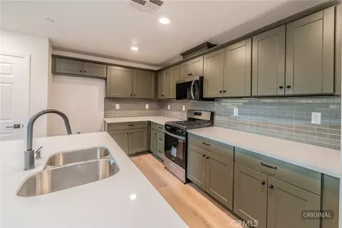 Kitchen - 453 Cimarron Dr, Perris, CA 92570 photo 3 of 3