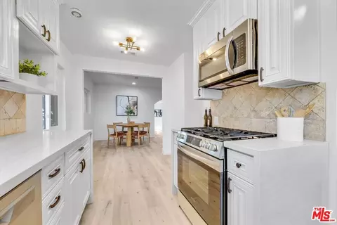 Kitchen - 717 S Clymar Ave, Compton, CA 90220 photo 5 of 6