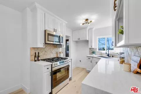 Kitchen - 717 S Clymar Ave, Compton, CA 90220 photo 2 of 6