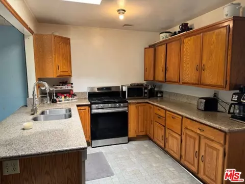 Kitchen - 1700 W Tichenor St, Compton, CA 90220 photo 2 of 3
