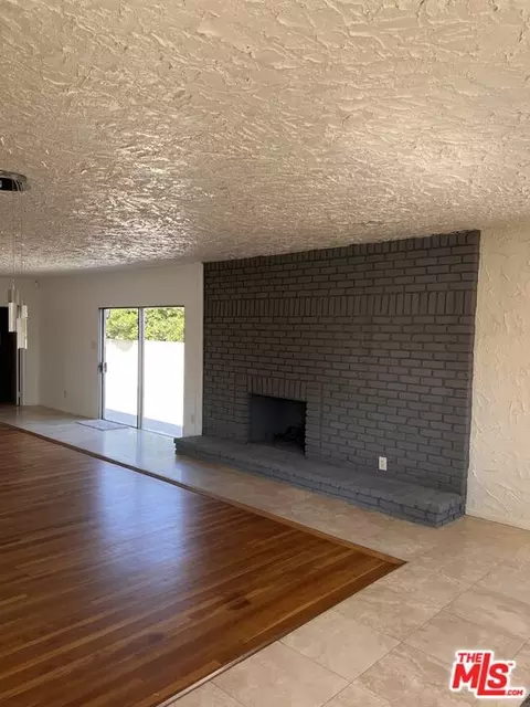 Living - 2327 N Slater Ave, Compton, CA 90222 photo 2 of 6