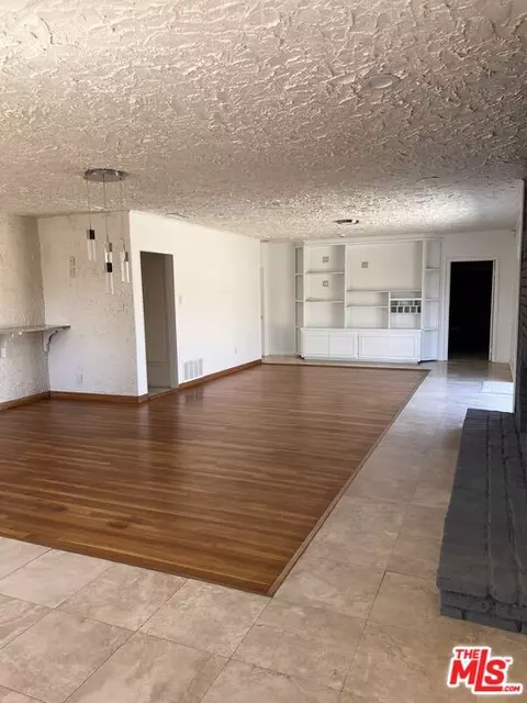 Living - 2327 N Slater Ave, Compton, CA 90222 photo 1 of 6