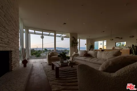 Living - 3908 S Cloverdale Ave, Los Angeles, CA 90008 photo 1 of 8