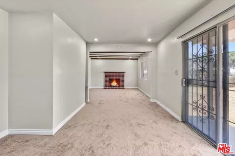 Living - 1026 S Harlan Ave, Compton, CA 90220 photo 3 of 13