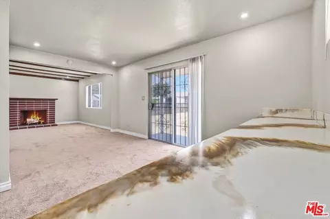 Living - 1026 S Harlan Ave, Compton, CA 90220 photo 4 of 13