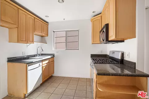 Kitchen - 7223 Baird Ave #104, Reseda, CA 91335 photo 2 of 3