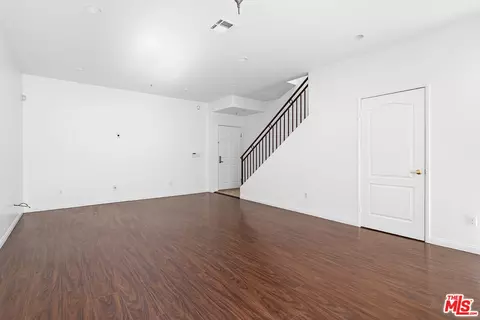 Living - 7223 Baird Ave #104, Reseda, CA 91335 photo 4 of 5