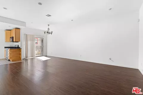 Living - 7223 Baird Ave #104, Reseda, CA 91335 photo 2 of 5
