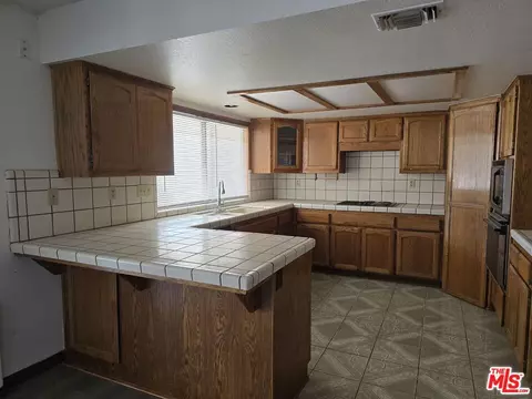 Kitchen - 3385 State Hwy 138, Pinon Hills, CA 92372 photo 2 of 3
