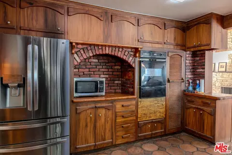 Kitchen - 18643 Strathern St, Reseda, CA 91335 photo 2 of 2