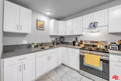Kitchen - 223 S Acacia Ave #205, Compton, CA 90220 photo 1 of 2