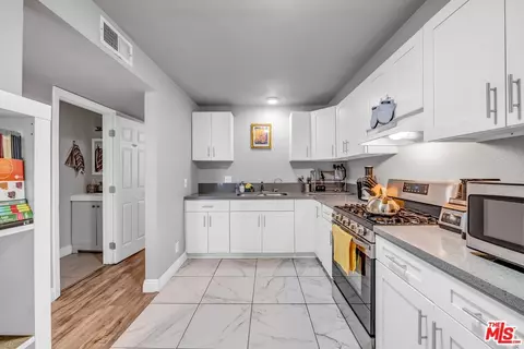 Kitchen - 223 S Acacia Ave #205, Compton, CA 90220 photo 2 of 2