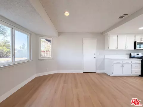 Living - 40733 176th St #E, Lancaster, CA 93535 photo 3 of 4