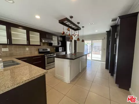 Kitchen - 3045 E Newgrove St, Lancaster, CA 93535 photo 2 of 4