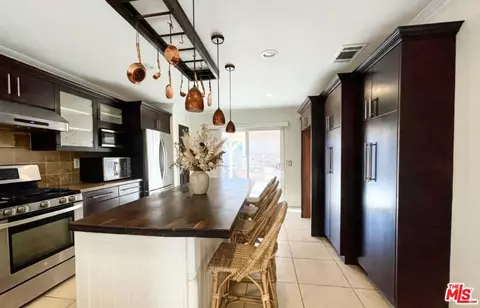 Kitchen - 3045 E Newgrove St, Lancaster, CA 93535 photo 3 of 4
