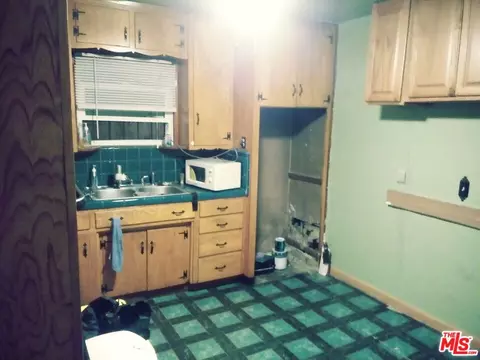 Kitchen - 413 N Broadacres Ave, Compton, CA 90220 photo 2 of 4